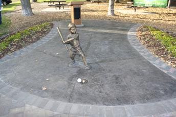 Sandlot sculpture by Randolph Rose at Vanderlaan Field